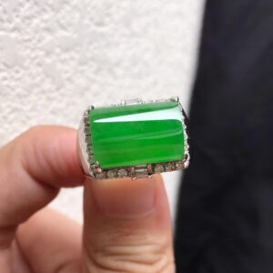 Full green oval emerald ring