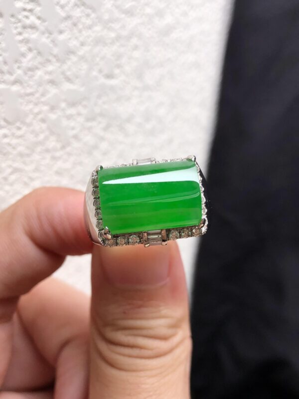Full green oval emerald ring
