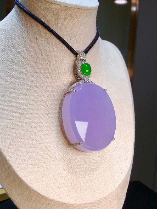Oval purple jade pendant